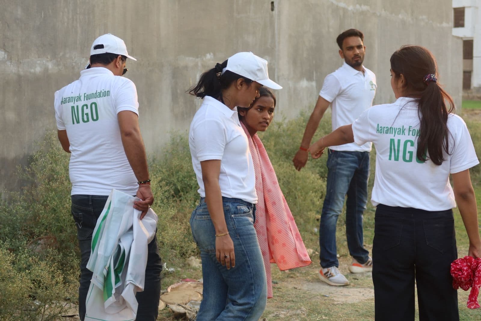 Students and community members supporting Aaranyak Foundation